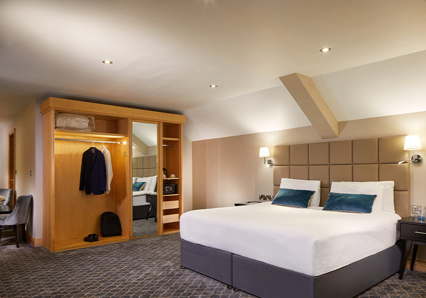 King size bed and built in wardrobe at Radisson Blu Hotel Athlone.