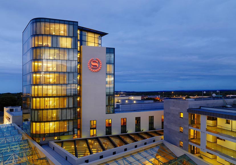 The Sheraton Athlone Hotel exterior at dusk.