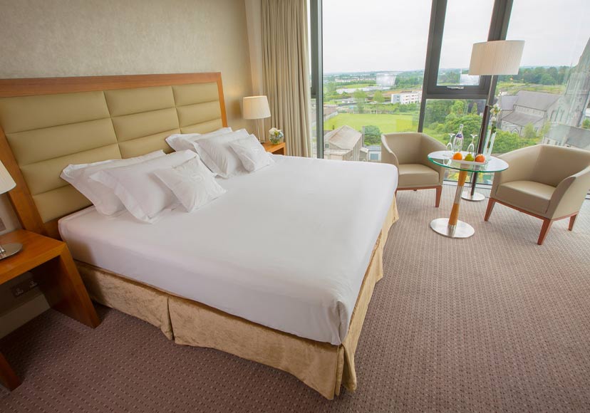 King bed overlooking the town at the Sheraton Athlone Hotel.