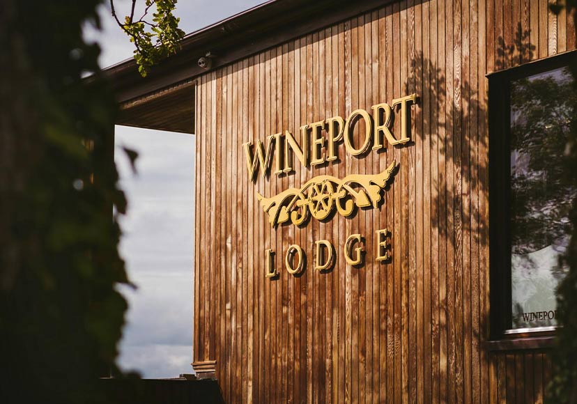 Wineport Lodge logo on exterior wall.