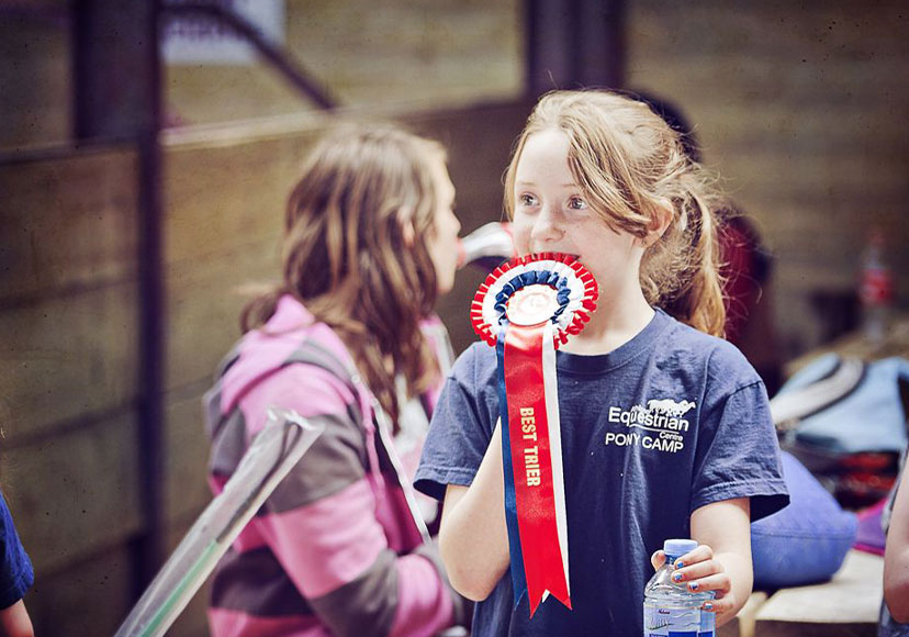 Girl recieving an award at Athlone Equestrian Centre.
