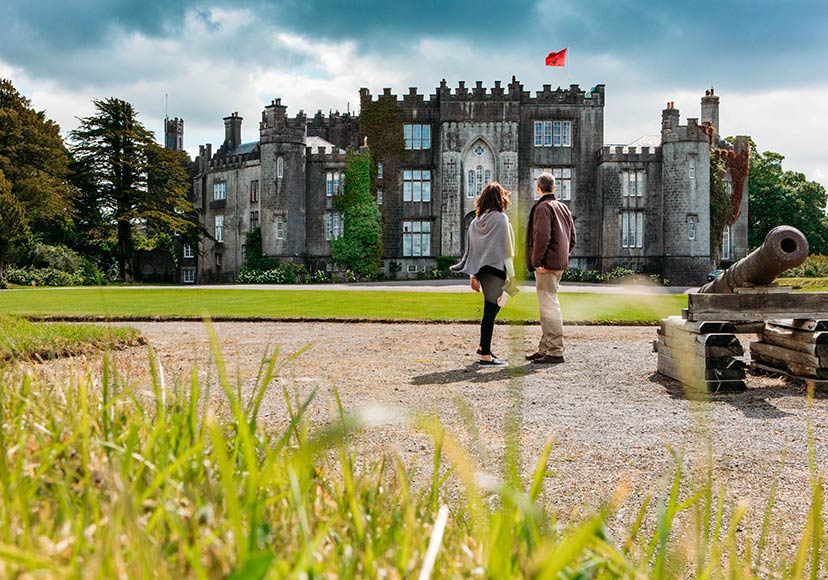 Couple viewing Birr Castle from the grounds.