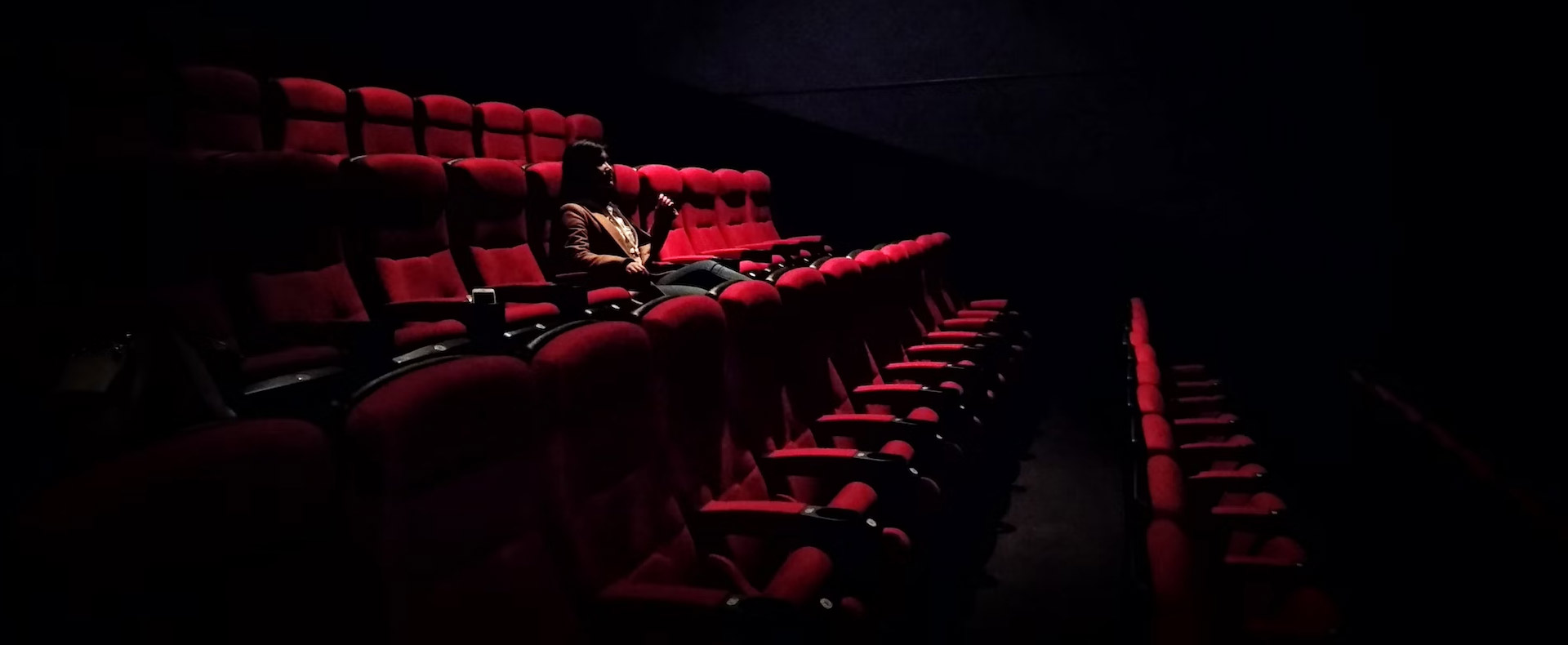 Woman enjoying movie at IMC Cinema Athlone.