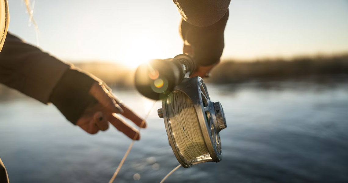 Man fly fishing at one of Athlone's lakes.