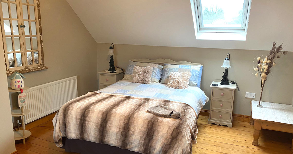 Attic bedroom at Glasson Stone Lodge