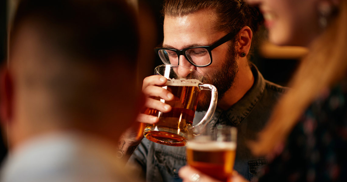 Friends enjoying a beer.