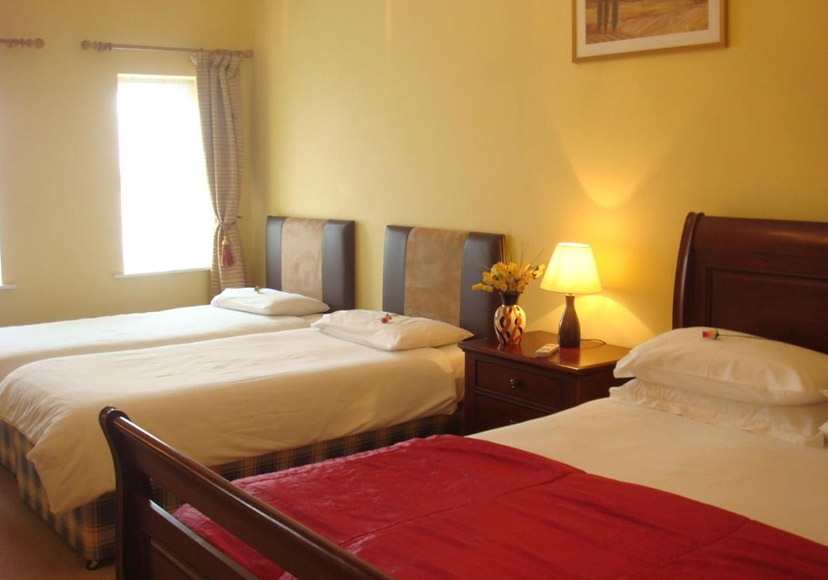 Three bed room at Shines Guesthouse.