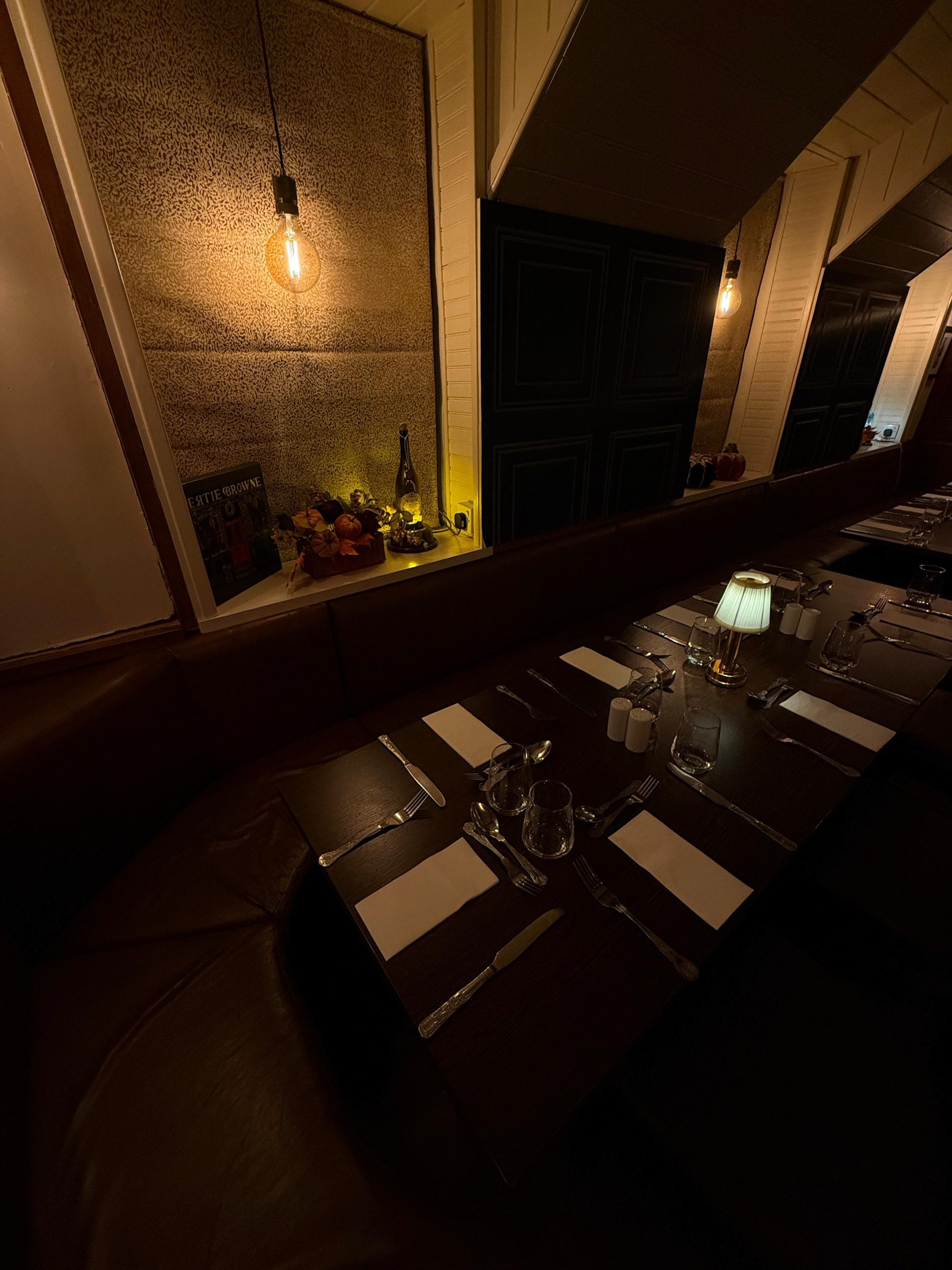 photo of table set up in the cellar bistro